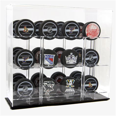 32 hockey puck display case.